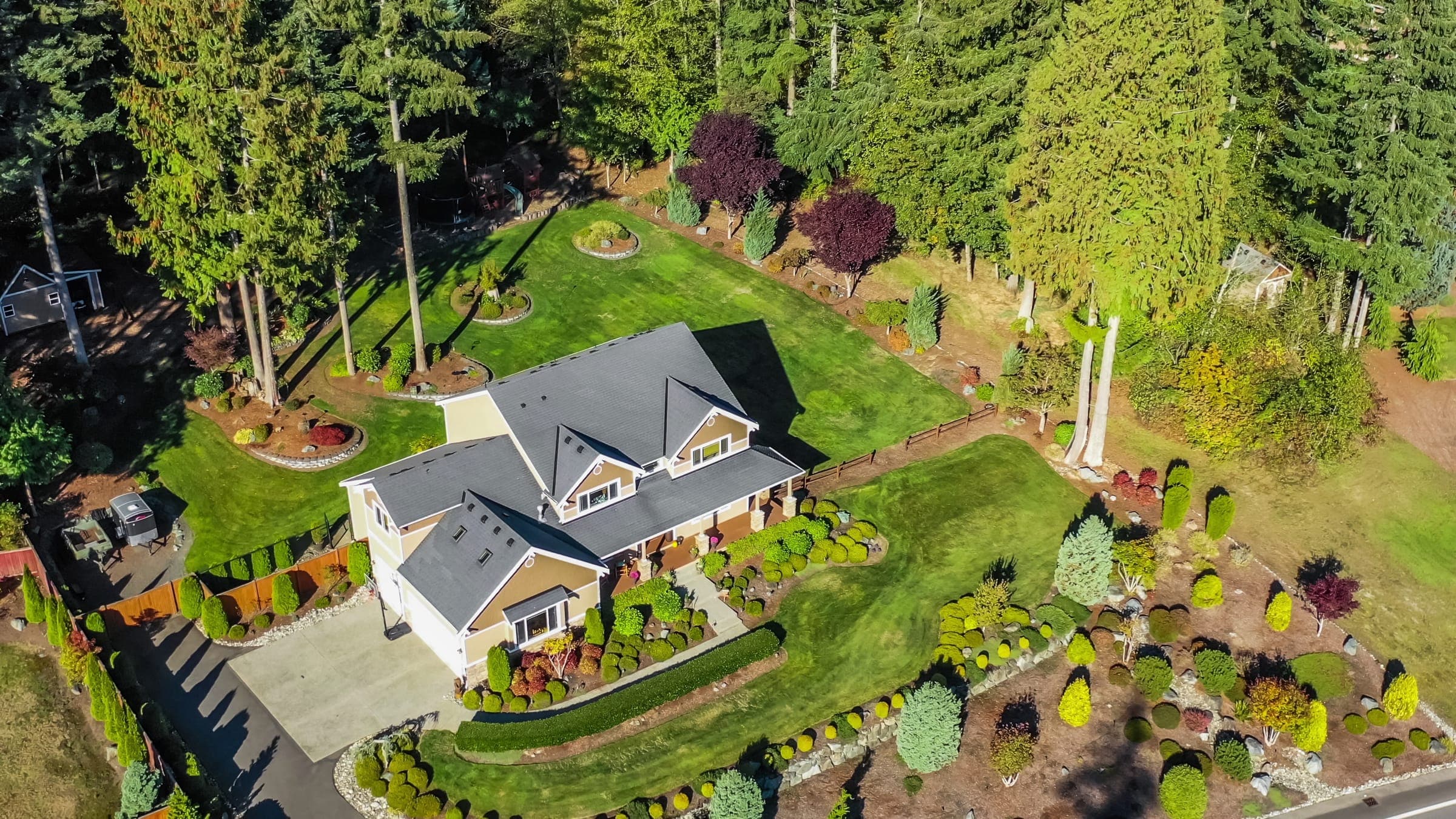 Aerial view of a landscaped two-story home
